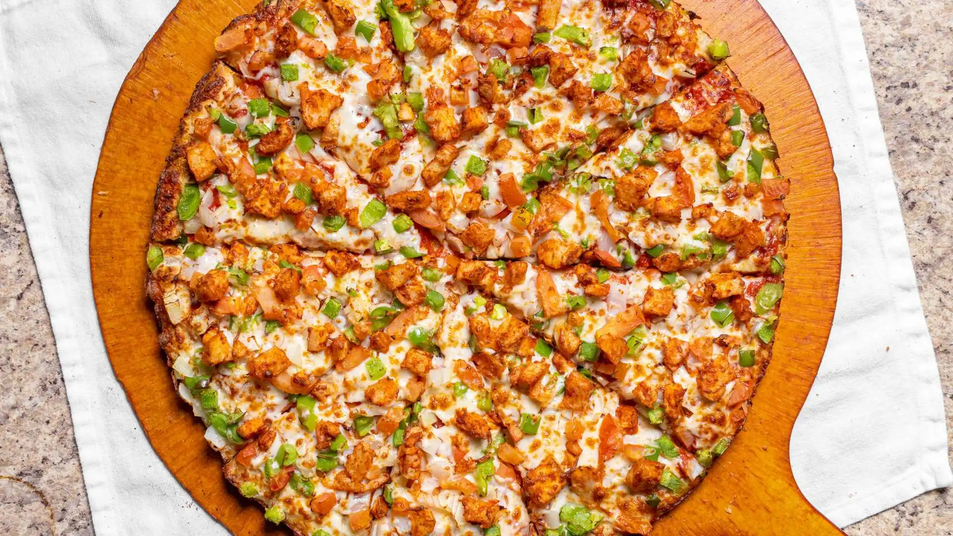 Delicious Tandoori Chicken Pizza at Pizza64 Edmonton